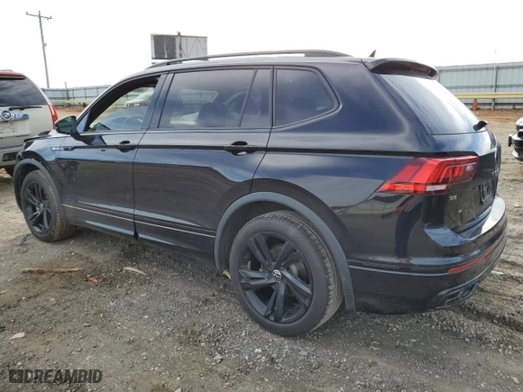 2023 Volkswagen Tiguan SE R-Line Black with VIN 3VVCB7AX9PM131559, listed as a Copart auction lot 44711665 with 28,166 mi miles and Salvage Title. Bid and sale history available at carsss.com. Image 2.