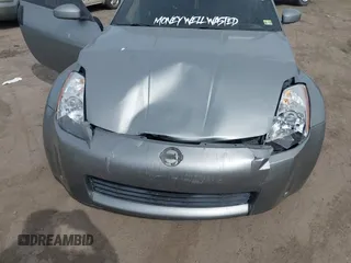 2004 Nissan 350Z Touring with VIN JN1AZ34DX4M100407, listed as a IAAI auction lot 41758380 with 154,166 mi miles. Bid and sale history available at carsss.com. Image 6.