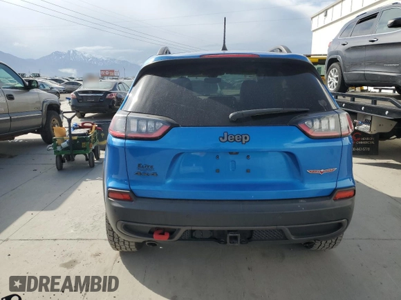2019 Jeep Cherokee Trailhawk z VIN 1C4PJMBX5KD122328, wystawiony jako Copart lot #54066865 z przebiegiem 59 924 mil mil oraz Szkoda całkowita • Salvage title. Historia ofert i sprzedaży dostępna na DreamBid. Obrazek 6.