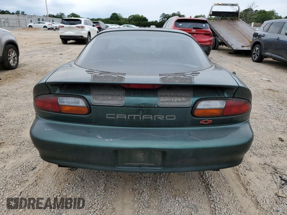 1997 Chevrolet Camaro Z28 z VIN 2G1FP22P6V2156828, wystawiony jako Copart lot #57651625 z przebiegiem 131 803 mil mil oraz Szkoda całkowita • Salvage title. Historia ofert i sprzedaży dostępna na DreamBid. Obrazek 6.