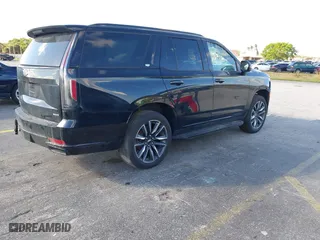 2023 Cadillac Escalade 4WD Sport with VIN 1GYS4EKL2PR351882, listed as a IAAI auction lot 41555895 with 58,703 mi miles. Bid and sale history available at carsss.com. Image 4.