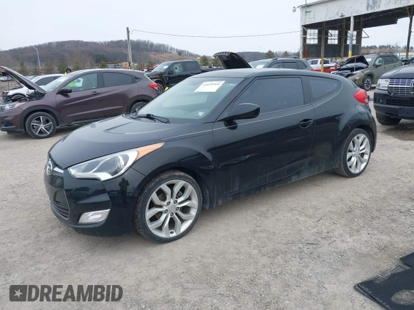 2012 Hyundai Veloster w/Black Int with VIN KMHTC6AD8CU066779, listed as a IAAI auction lot 41699960 with 160,875 mi miles and . Bid and sale history available at DreamBid. Image 18.