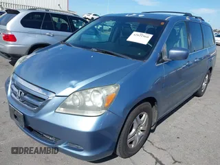2006 Honda Odyssey EX-L z VIN 5FNRL38706B075356, wystawiony jako IAAI lot #42021960 z przebiegiem 120 455 mil mil oraz . Historia ofert i sprzedaży dostępna na DreamBid. Obrazek 18.