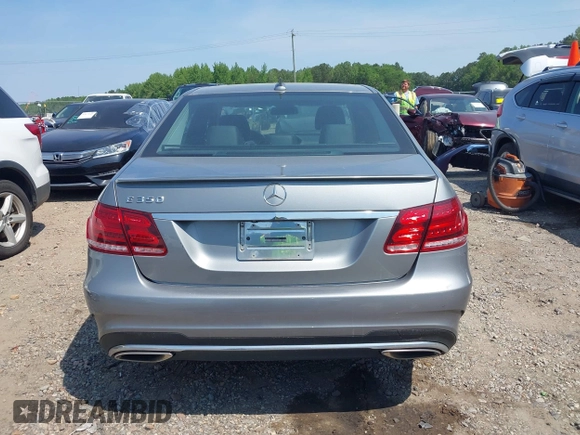 2014 Mercedes-Benz E 350 Sport with VIN WDDHF5KB5EA897093, listed as a IAAI auction lot 42152144 with 120,627 mi miles and . Bid and sale history available at DreamBid. Image 16.