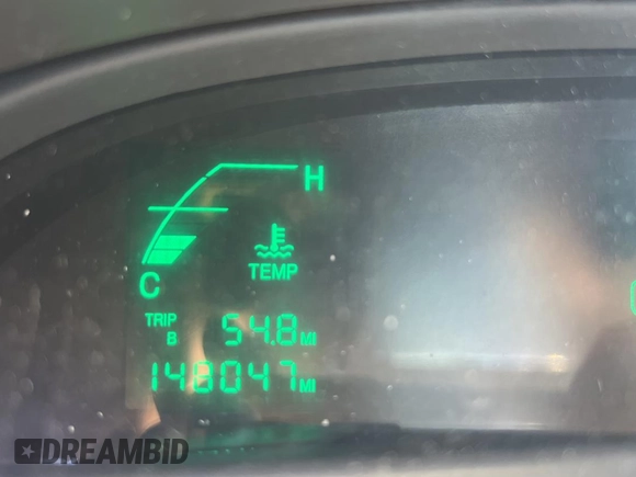 2004 Cadillac DeVille z VIN 1G6KD54Y84U105851, wystawiony jako Copart lot #59424695 z przebiegiem 148 047 mil mil oraz Tytuł czysty. Historia ofert i sprzedaży dostępna na DreamBid. Obrazek 8.
