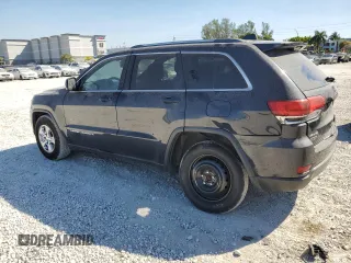 2014 Jeep Grand Cherokee Altitude with VIN 1C4RJFAG8EC242995, listed as a Copart auction lot 48572595 with 138,468 mi miles and Salvage Title. Bid and sale history available at carsss.com. Image 2.