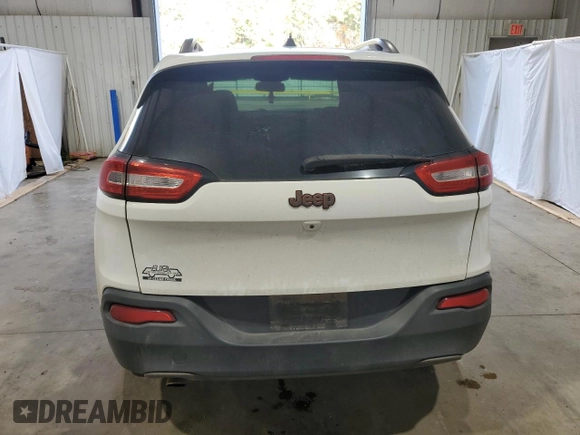 2016 Jeep Cherokee Altitude with VIN 1C4PJLCB0GW350486, listed as a Copart auction lot 85436634 with 198,587 mi miles and Salvage Title. Bid and sale history available at carsss.com. Image 6.