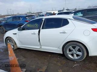 2015 Kia Optima LX with VIN KNAGM4A75F5644401, listed as a IAAI auction lot 41672679 with 217,636 mi miles. Bid and sale history available at carsss.com. Image 14.