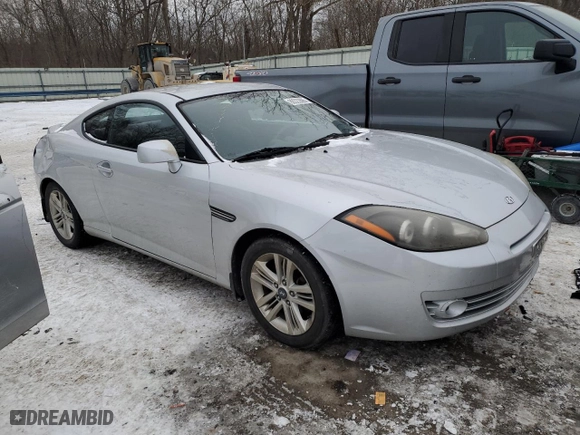 2007 Hyundai Tiburon GS with VIN KMHHM66D97U255247, listed as a Copart auction lot 88322895 with 144,113 mi miles and Salvage Title. Bid and sale history available at carsss.com. Image 4.