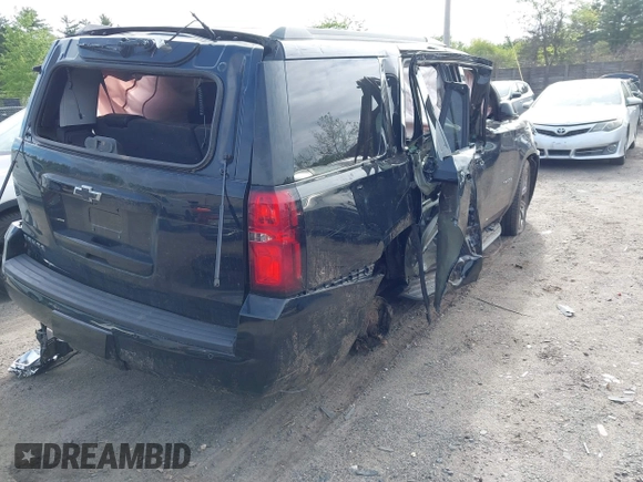 2016 Chevrolet Tahoe LT z VIN 1GNSKBKC7GR331631, wystawiony jako IAAI lot #42300624 z przebiegiem 73 126 mil mil oraz . Historia ofert i sprzedaży dostępna na DreamBid. Obrazek 6.