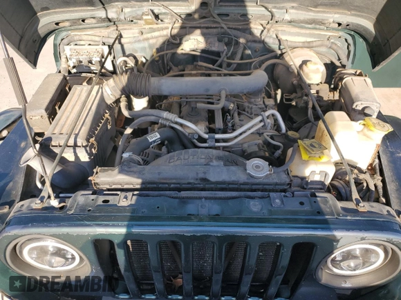 2000 Jeep Wrangler Sahara with VIN 1J4FA59S0YP795198, listed as a Copart auction lot 87920205 with 150,148 mi miles and Salvage Title. Bid and sale history available at carsss.com. Image 11.