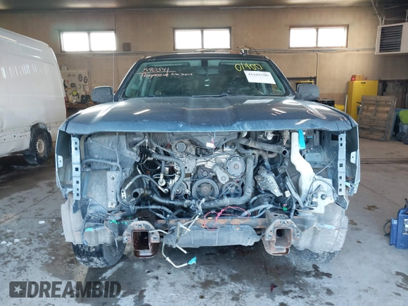 2014 Chevrolet Silverado 1500 LT with VIN 1GCVKREC0EZ130211, listed as a IAAI auction lot 41601900 with 209,604 mi miles and . Bid and sale history available at DreamBid. Image 13.