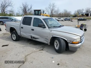 2000 Dodge Dakota Sport with VIN 1B7GL2AX6YS681262, listed as a Copart auction lot 51145495 with 212,463 mi miles and Salvage Title. Bid and sale history available at carsss.com. Image 4.