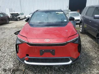 2023 Toyota bZ4X XLE with VIN JTMABACA0PA045579, listed as a Copart auction lot 65738864 with 5,487 mi miles and Salvage Title. Bid and sale history available at carsss.com. Image 5.