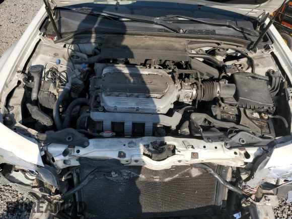 2009 Acura TL z VIN 19UUA86259A020419, wystawiony jako Copart lot #58729675 z przebiegiem 213 697 mil mil oraz Szkoda całkowita • Salvage title. Historia ofert i sprzedaży dostępna na DreamBid. Obrazek 11.