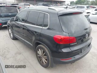 2012 Volkswagen Tiguan SE with VIN WVGAV7AX9CW611202, listed as a IAAI auction lot 41944210 with 118,002 mi miles and . Bid and sale history available at DreamBid. Image 3.