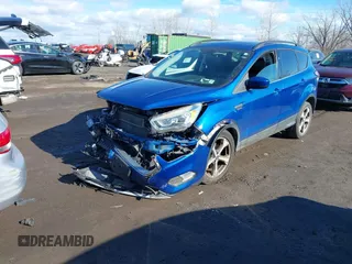 2017 Ford Escape SE with VIN 1FMCU9G91HUE28282, listed as a IAAI auction lot 41471957 with 23,552 mi miles. Bid and sale history available at carsss.com. Image 2.