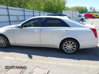 2015 Cadillac CTS Luxury AWD z VIN 1G6AX5SX5F0103725, wystawiony jako IAAI lot #42226485 z przebiegiem 112 437 mil mil oraz . Historia ofert i sprzedaży dostępna na DreamBid. Obrazek 14.