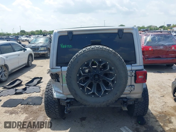 2021 Jeep Wrangler Unlimited High Altitude with VIN 1C4HJXEG3MW511185, listed as a IAAI auction lot 42125883 with 45,564 mi miles and . Bid and sale history available at DreamBid. Image 16.