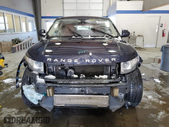 2015 Land Rover Range Rover Evoque Prestige with VIN SALVV2BG3FH984910, listed as a Copart auction lot 87200704 with 87,467 mi miles and Salvage title. Bid and sale history available at DreamBid. Image 5.