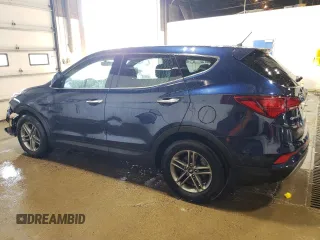 2018 Hyundai Santa Fe 2.4L z VIN 5XYZTDLB4JG553894, wystawiony jako Copart lot #56859585 z przebiegiem 97 313 mil mil oraz Szkoda całkowita • Salvage title. Historia ofert i sprzedaży dostępna na DreamBid. Obrazek 2.