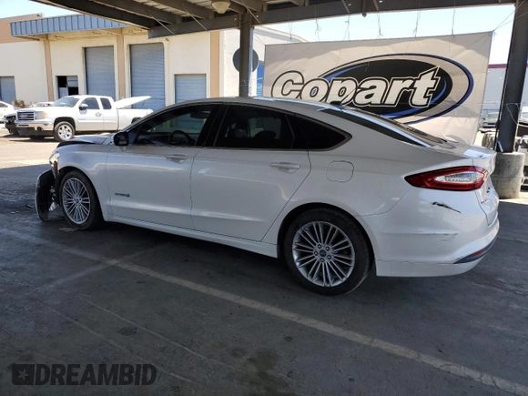 2013 Ford Fusion SE Hybrid with VIN 3FA6P0LU1DR192576, listed as a Copart auction lot 58025775 with 152,155 mi miles and Salvage title. Bid and sale history available at DreamBid. Image 2.
