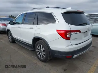 2020 Honda Pilot EX-L with VIN 5FNYF5H57LB003059, listed as a IAAI auction lot 41685916 with 114,742 mi miles. Bid and sale history available at carsss.com. Image 3.