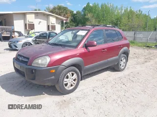 2007 Hyundai Tucson SE with VIN KM8JN12DX7U576110, listed as a IAAI auction lot 42068434 with 147,851 mi miles. Bid and sale history available at carsss.com. Image 2.