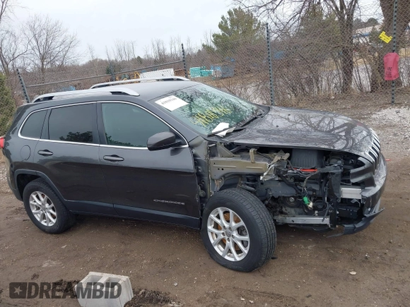 2015 Jeep Cherokee Latitude with VIN 1C4PJMCS9FW769294, listed as a IAAI auction lot 41810346 with 94,975 mi miles and . Bid and sale history available at DreamBid. Image 14.