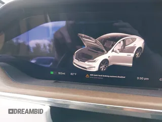 2021 Tesla Model S Long Range with VIN 5YJSA1E57MF428512, listed as a IAAI auction lot 42511020 with 29,611 mi miles and . Bid and sale history available at DreamBid. Image 17.