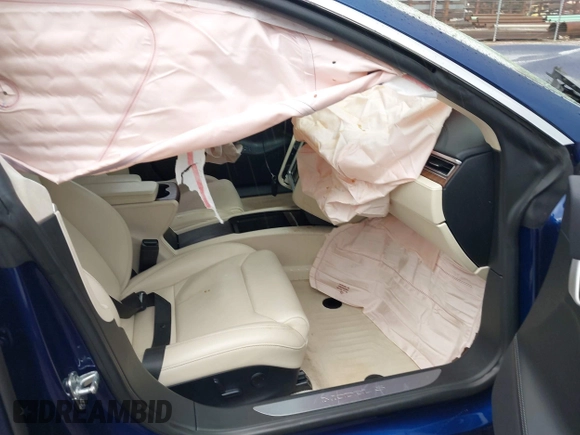 2017 Tesla Model S 100D with VIN 5YJSA1E27HF220982, listed as a IAAI auction lot 41731047 with Not Provided miles and . Bid and sale history available at DreamBid. Image 5.