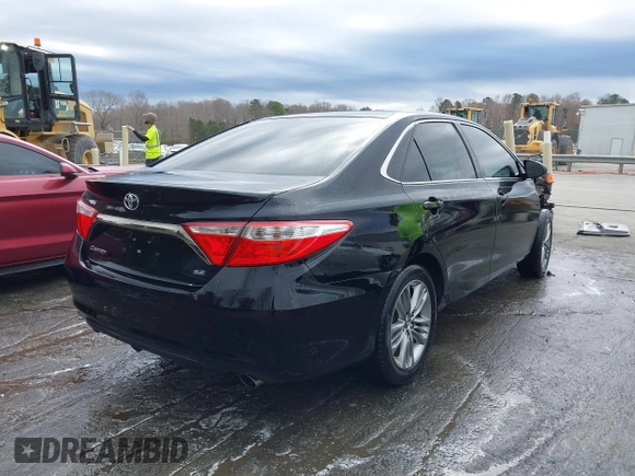 2015 Toyota Camry XLE with VIN 4T1BF1FK9FU114582, listed as a IAAI auction lot 41801187 with 165,199 mi miles. Bid and sale history available at carsss.com. Image 4.