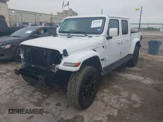 2023 Jeep Gladiator Overland z VIN 1C6HJTFGXPL522706, wystawiony jako IAAI lot #41923655 z przebiegiem 33 010 mil mil oraz . Historia ofert i sprzedaży dostępna na DreamBid. Obrazek 2.