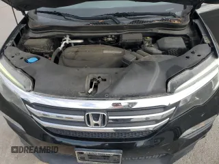 2018 Honda Pilot EX-L z VIN 5FNYF5H54JB015201, wystawiony jako Copart lot #82720584 z przebiegiem 113 273 mil mil oraz Szkoda całkowita • Salvage title. Historia ofert i sprzedaży dostępna na DreamBid. Obrazek 14.