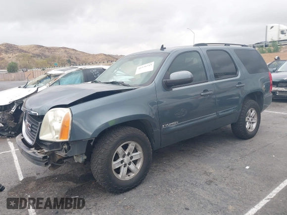 2008 GMC Yukon SLE w/3SA with VIN 1GKFC13C28J166446, listed as a IAAI auction lot 41531715 with 126,926 mi miles. Bid and sale history available at carsss.com. Image 2.