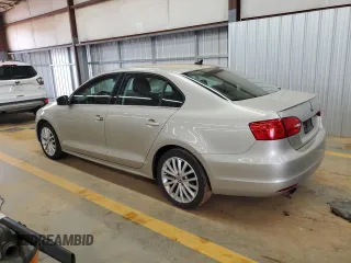 2014 Volkswagen Jetta TDI w/Premium with VIN 3VWLL7AJ9EM261908, listed as a Copart auction lot 60703205 with 128,892 mi miles and Salvage title. Bid and sale history available at DreamBid. Image 2.