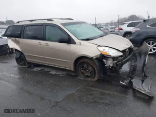 2009 Toyota Sienna CE with VIN 5TDZK23C99S253511, listed as a IAAI auction lot 41556433 with 239,778 mi miles. Bid and sale history available at carsss.com. Image 1.