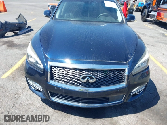 2015 Infiniti Q70 with VIN JN1BY1PP8FM601834, listed as a IAAI auction lot 42028330 with 106,285 mi miles and . Bid and sale history available at DreamBid. Image 12.