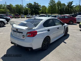 2018 Subaru WRX STI Launch z VIN JF1VA2W60J9804392, wystawiony jako Copart lot #58350815 z przebiegiem 112 607 mil mil oraz Tytuł czysty. Historia ofert i sprzedaży dostępna na DreamBid. Obrazek 4.