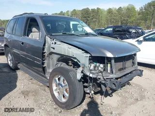 2005 GMC Envoy SLE with VIN 1GKDS13S452306939, listed as a IAAI auction lot 41931667 with 236,955 mi miles. Bid and sale history available at carsss.com. Image 1.