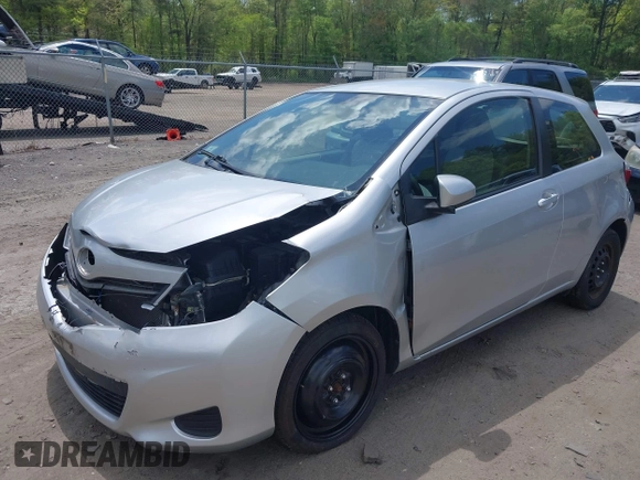 2014 Toyota Yaris L with VIN JTDJTUD38ED587118, listed as a IAAI auction lot 42211424 with 94,616 mi miles and . Bid and sale history available at DreamBid. Image 2.