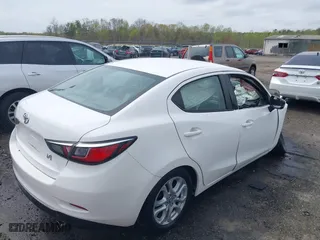 2017 Toyota Yaris iA with VIN 3MYDLBYV9HY175824, listed as a IAAI auction lot 41954529 with 62,381 mi miles. Bid and sale history available at carsss.com. Image 4.