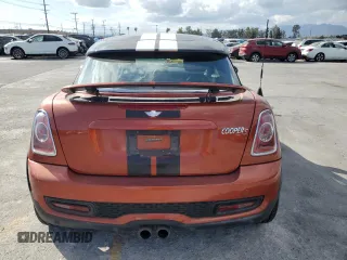 2013 MINI Coupe S z VIN WMWSX3C59DT466802, wystawiony jako Copart lot #56860965 z przebiegiem 88 053 mil mil oraz Szkoda całkowita • Salvage title. Historia ofert i sprzedaży dostępna na DreamBid. Obrazek 6.