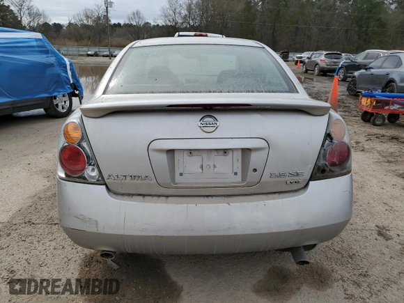 2003 Nissan Altima SE z VIN 1N4BL11D53C289991, wystawiony jako Copart lot #46164355 z przebiegiem 131 437 mil mil oraz Szkoda całkowita • Salvage title. Historia ofert i sprzedaży dostępna na DreamBid. Obrazek 6.