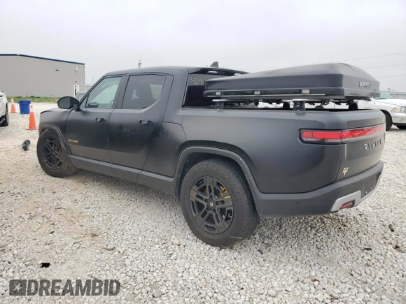 2022 Rivian R1T Adventure z VIN 7FCTGAAA5NN015734, wystawiony jako Copart lot #44019715 z przebiegiem 27 542 mil mil oraz Szkody całkowita. Historia ofert i sprzedaży dostępna na DreamBid. Obrazek 2.