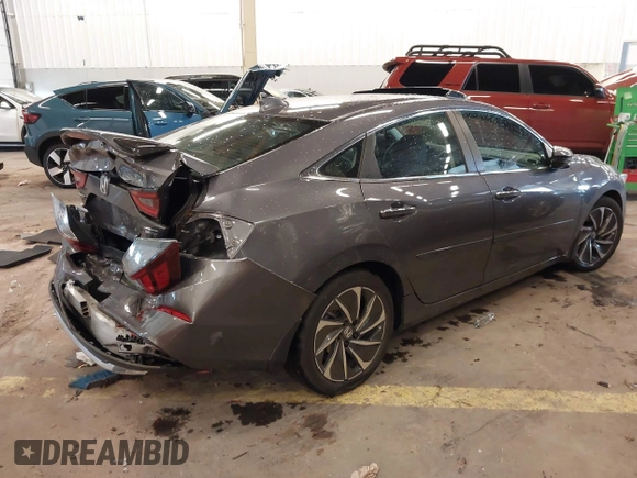 2022 Honda Insight Touring with VIN 19XZE4F96NE008687, listed as a IAAI auction lot 41653624 with 32,663 mi miles and . Bid and sale history available at DreamBid. Image 4.