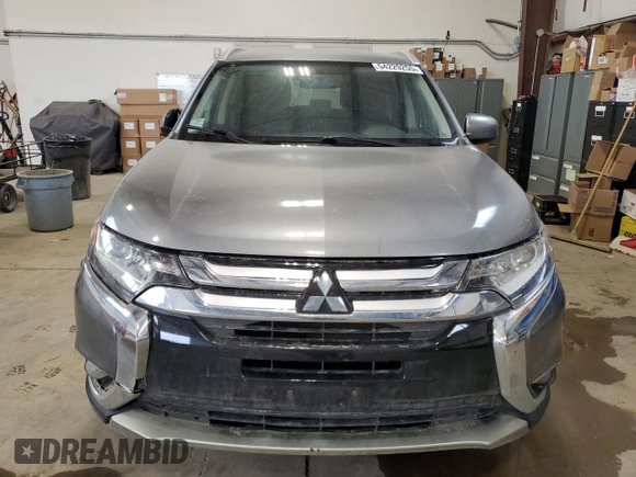 2016 Mitsubishi Outlander ES z VIN JA4AZ2A34GZ604519, wystawiony jako Copart lot #54229255 z przebiegiem 153 703 mil mil oraz Szkoda całkowita • Salvage title. Historia ofert i sprzedaży dostępna na DreamBid. Obrazek 5.
