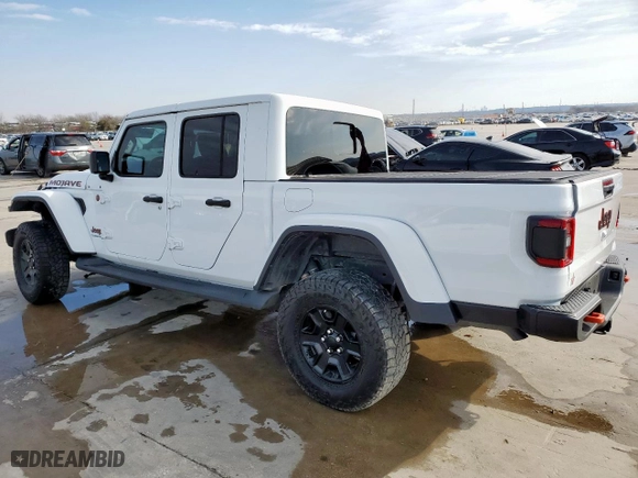 2021 Jeep Gladiator Mojave with VIN 1C6JJTEG3ML621348, listed as a Copart auction lot 45310285 with 20,671 mi miles and Salvage Title. Bid and sale history available at carsss.com. Image 2.