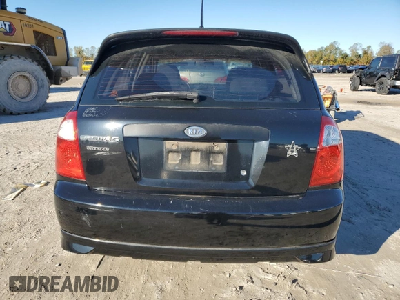 2005 Kia Spectra with VIN KNAFE161355073968, listed as a Copart auction lot 84543784 with 166,858 mi miles and Salvage Title. Bid and sale history available at carsss.com. Image 6.