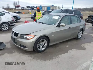 2008 BMW 3 Series 328i with VIN WBAVA33518K053136, listed as a IAAI auction lot 41640409 with 89,506 mi miles and . Bid and sale history available at DreamBid. Image 2.